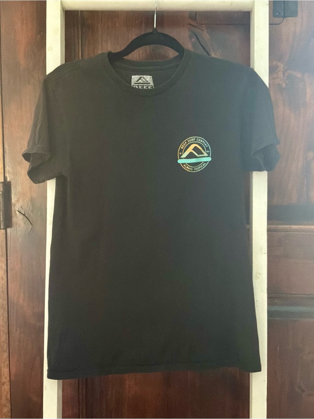 Reef Black Short Sleeve Tee with Teal & Gold Logo